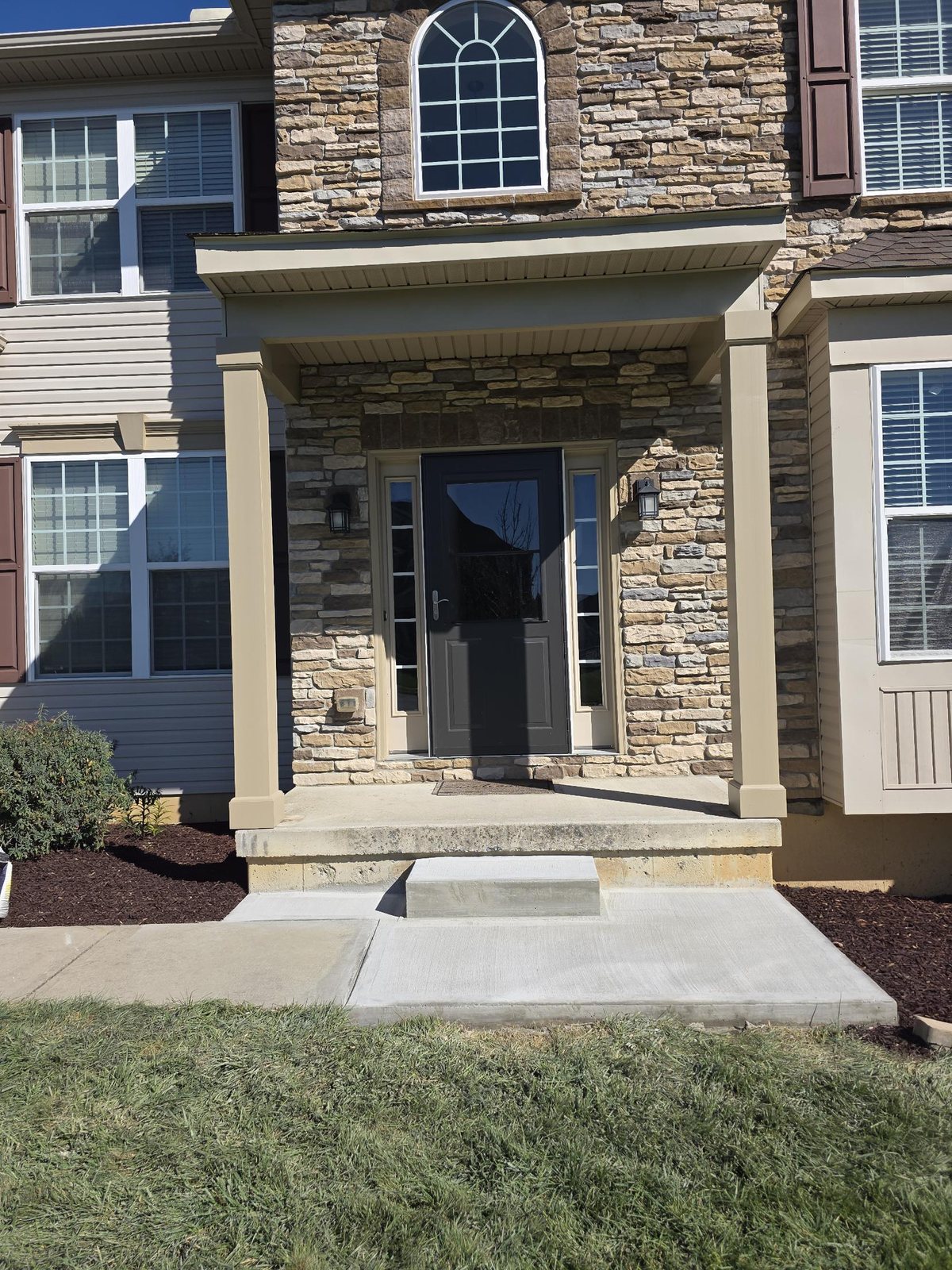 After: the same porch with new square columns