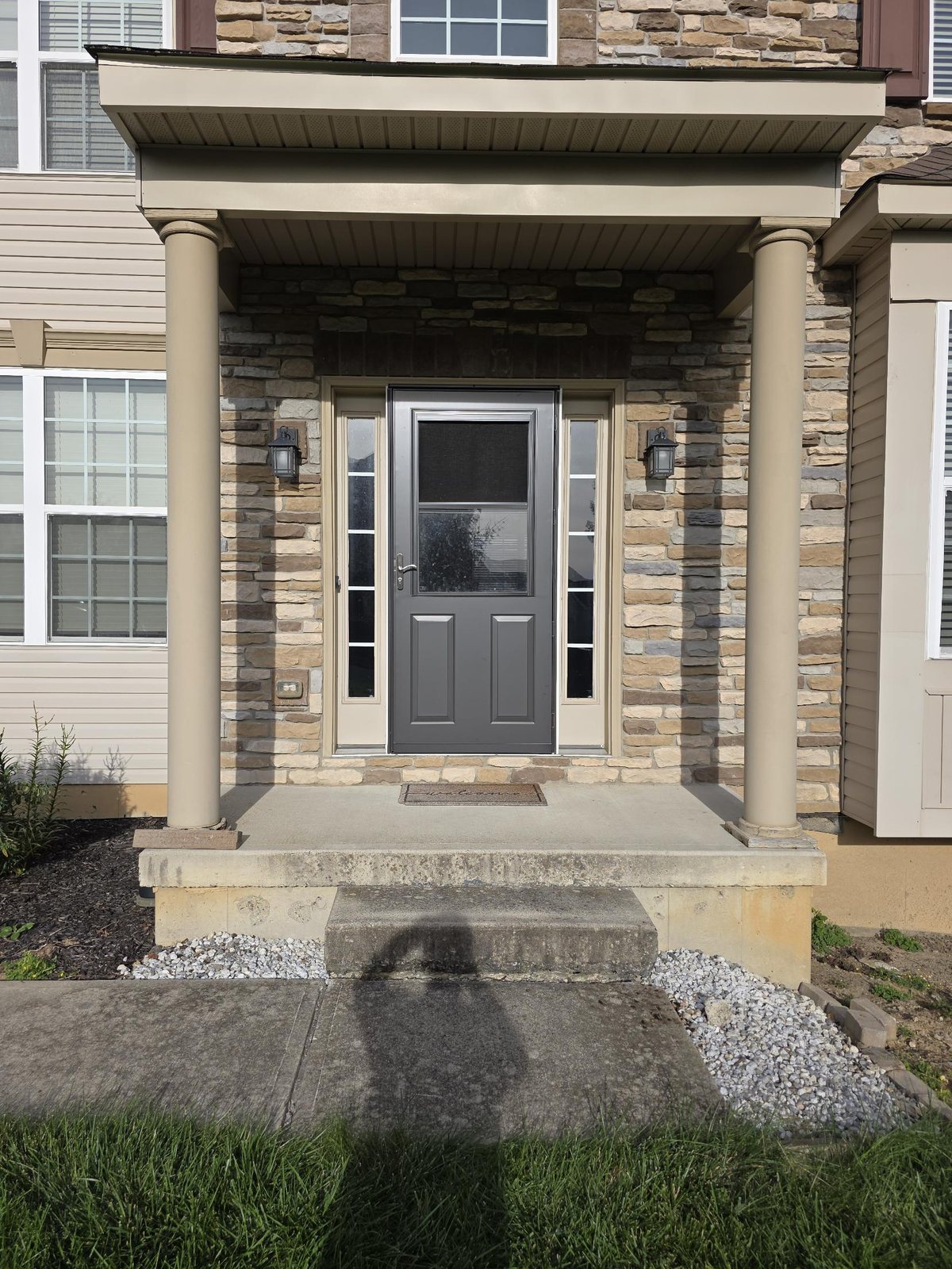 Before: front porch with old round columns