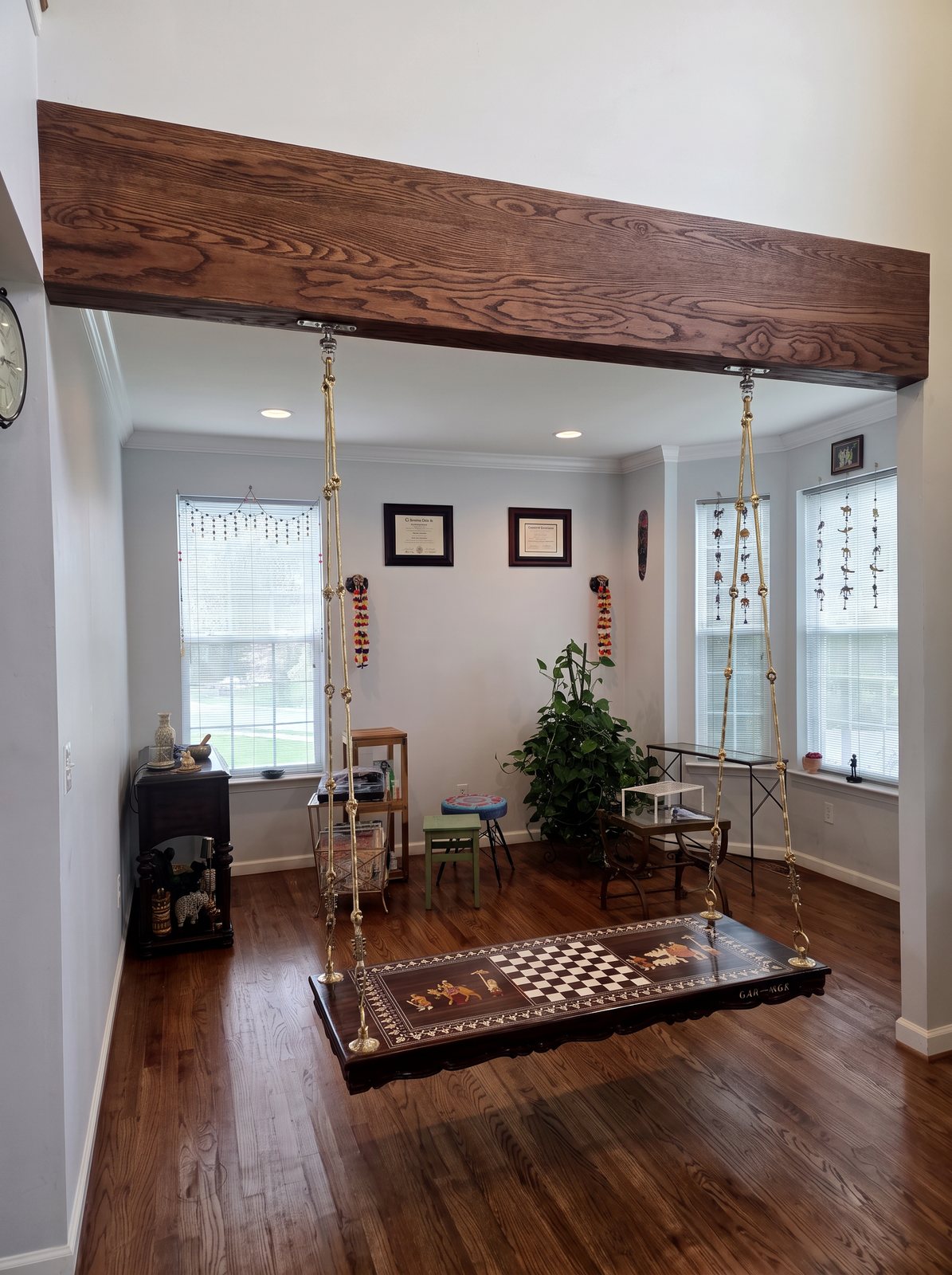 After: the same opening finished with a stained wood beam